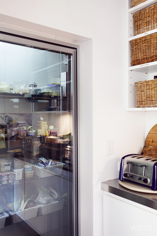 There is no refrigerator in Kate's house but there is a cool room! Her stunning and practical kitchen is really the heart of the house