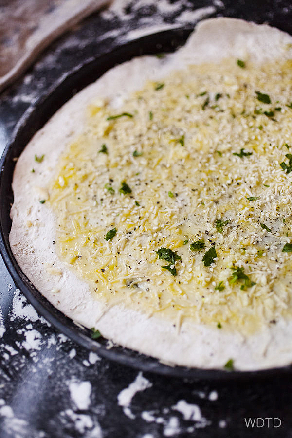 And John's signature garlic, parmesan, parsley and sesame seed pizza